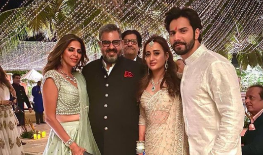 Varun Dhawan and Natasha Dalal pose happily with Karan Johar, Kunal Kohli and others